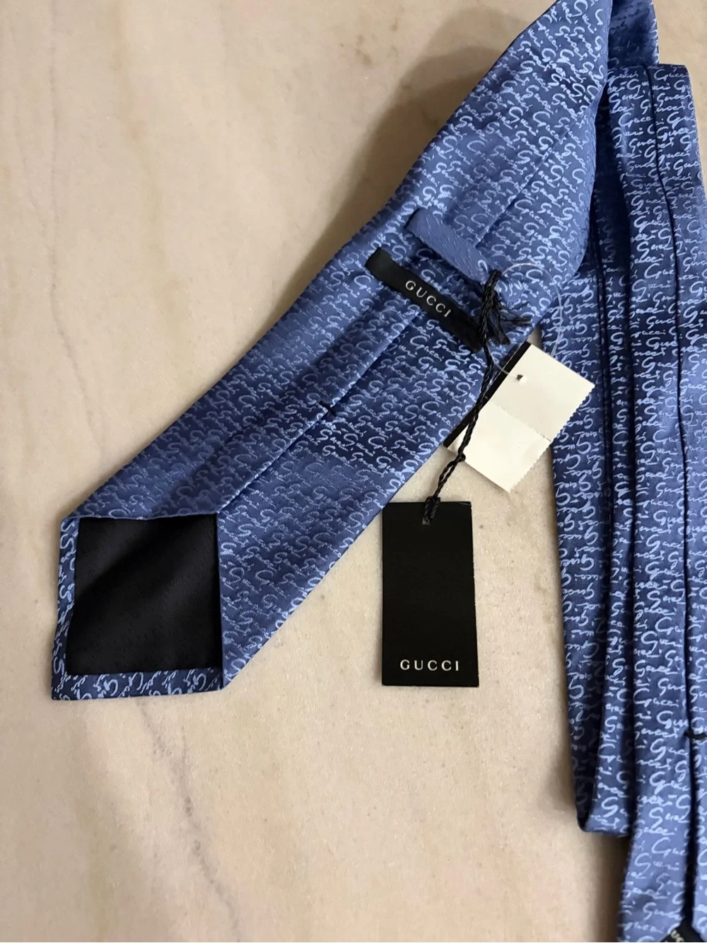 Gucci Blue Silk Tie, featuring a signature monogram pattern blue silk New tags